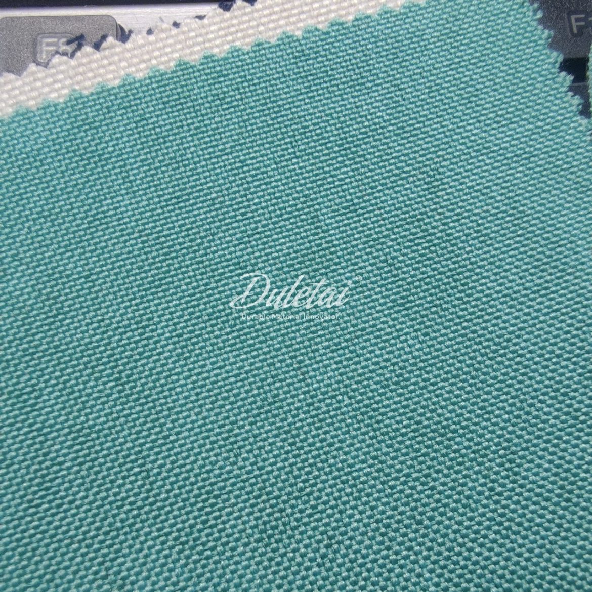 Polyester upholstery fabric is a soft, lightweight woven fabric