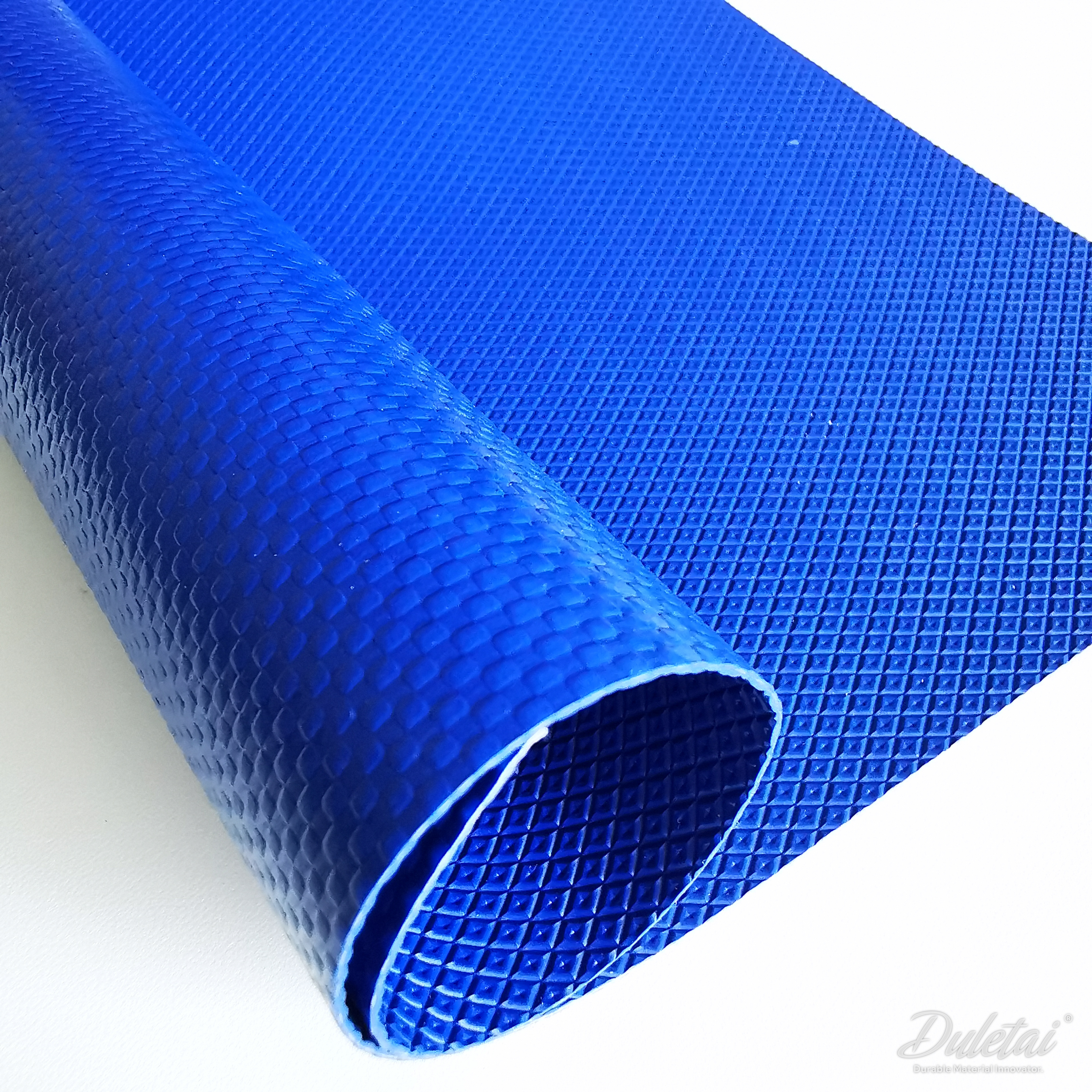 DLT-5153-detail-2-duletai-v2 DLT-5153 heavy duty PVC tarp fabric showing blue embossed texture