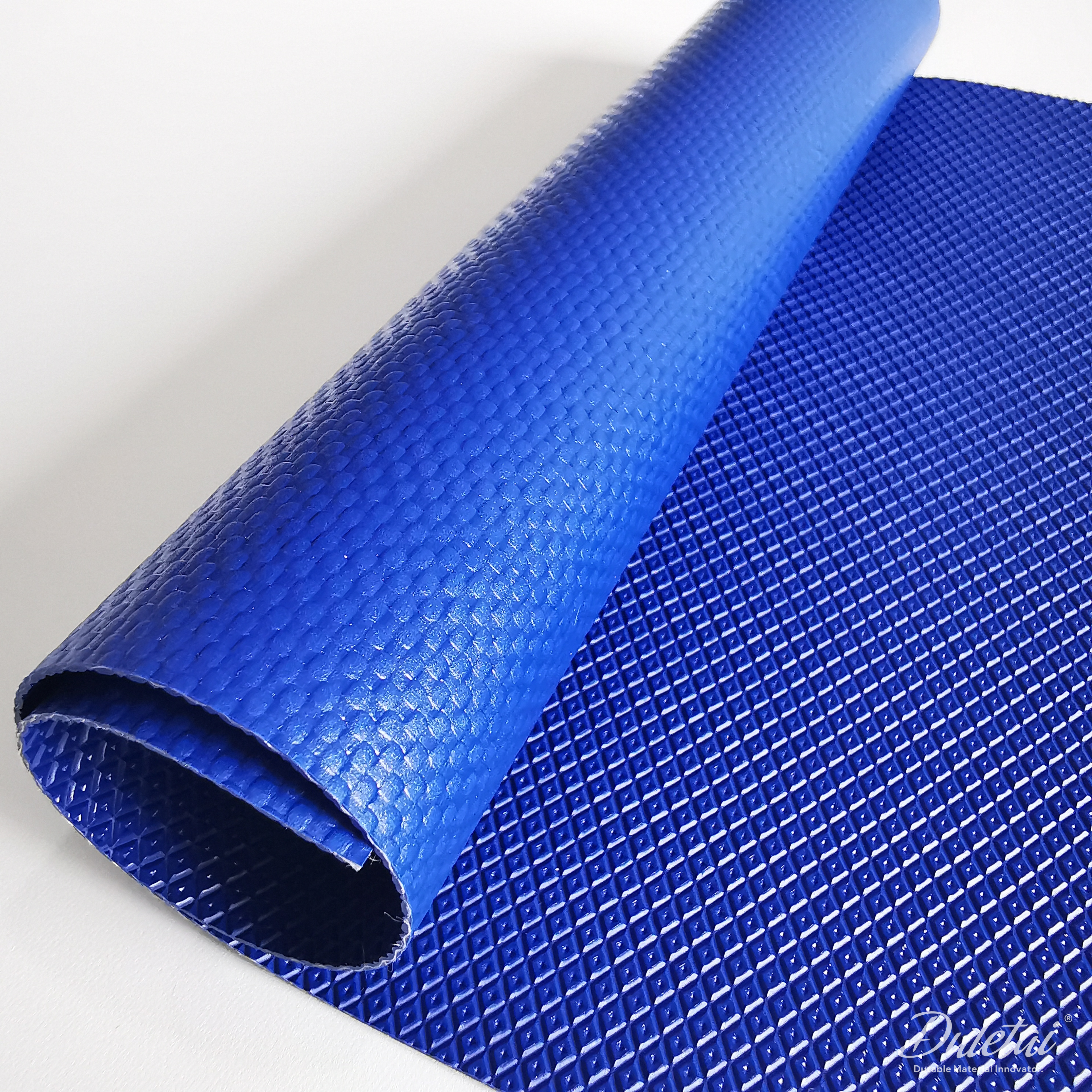 DLT-5153-detail-3-duletai Blue heavy duty PVC tarp fabric DLT-5153, close-up of coated surface